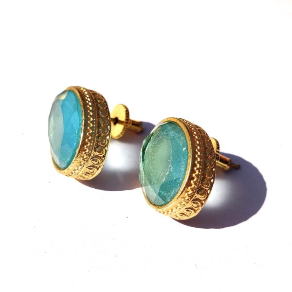 Ocean Blue Topaz Goldplated Studs with Detailed Bezel Side