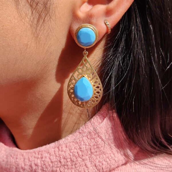 Turquoise Frame Dangling Earrings on Ear