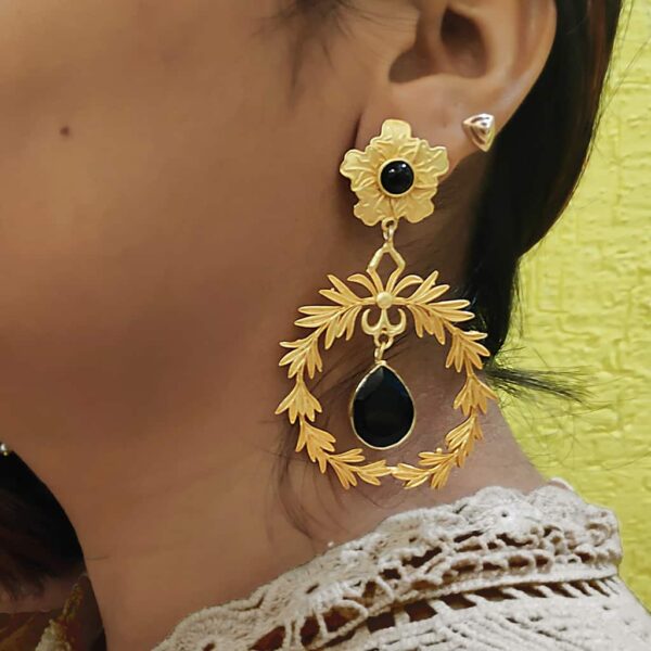 Golden Wreath Black Onyx Studded Dangling Earrings on Ear