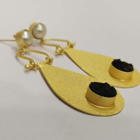 Golden Swing Dangler Black and White Earrings