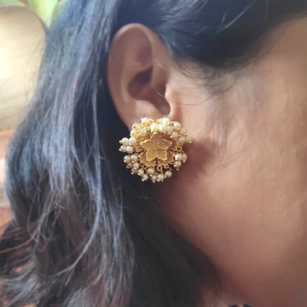 Goldplated Mogra Earrings with Dancing Pearl Drops on ears