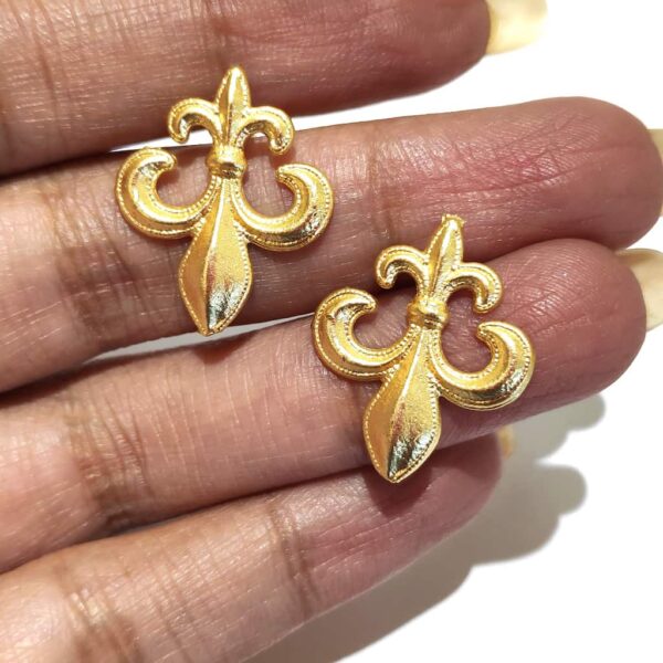 Fleur de lis Stud Earrings in Hands 2