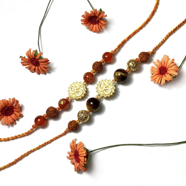 Orange Onyx and Tigers Eye Gold plated OM Rakhi Combo set