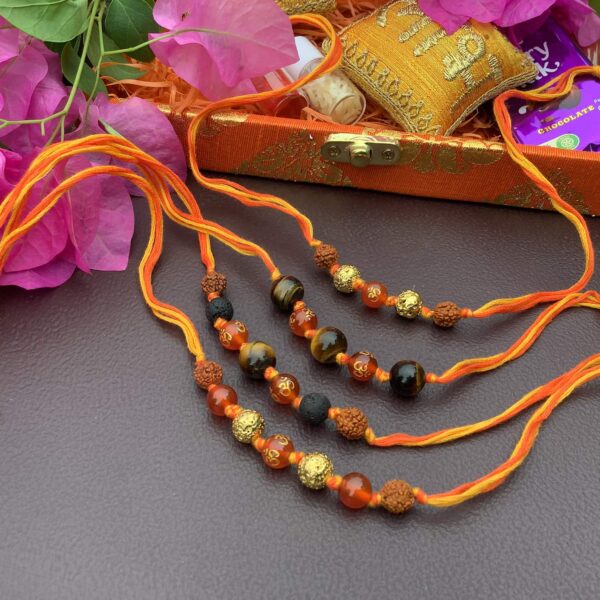 Natural Orange Onyx OM Lava and Tigers eye with Rudraksha Rakhi Combo Set of 4 Stylish