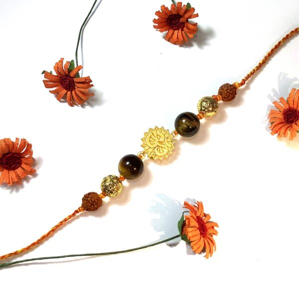 Natural Tigers Eye with Gold plated OM and Rudraksha Rakhi