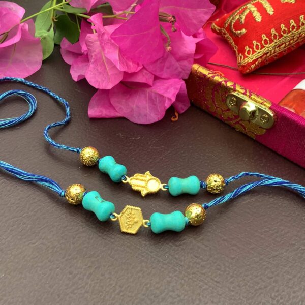 Natural Turquoise with Hamsa & Hexagon Gold plated Rakhi Combo with Packaging1